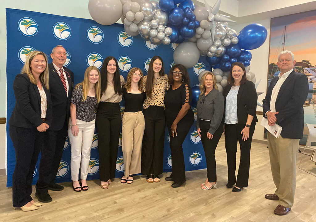 Team Pursuit of Excellence: From left, Palm Coast Acting City Manager Lauren Johnston joins event judge Mayor David Alfin, Team Pursuit of Excellence, event judges Carmen Gray, Teresa Rizzo and Marijo Cyzycki and team coach Martin Luytjes